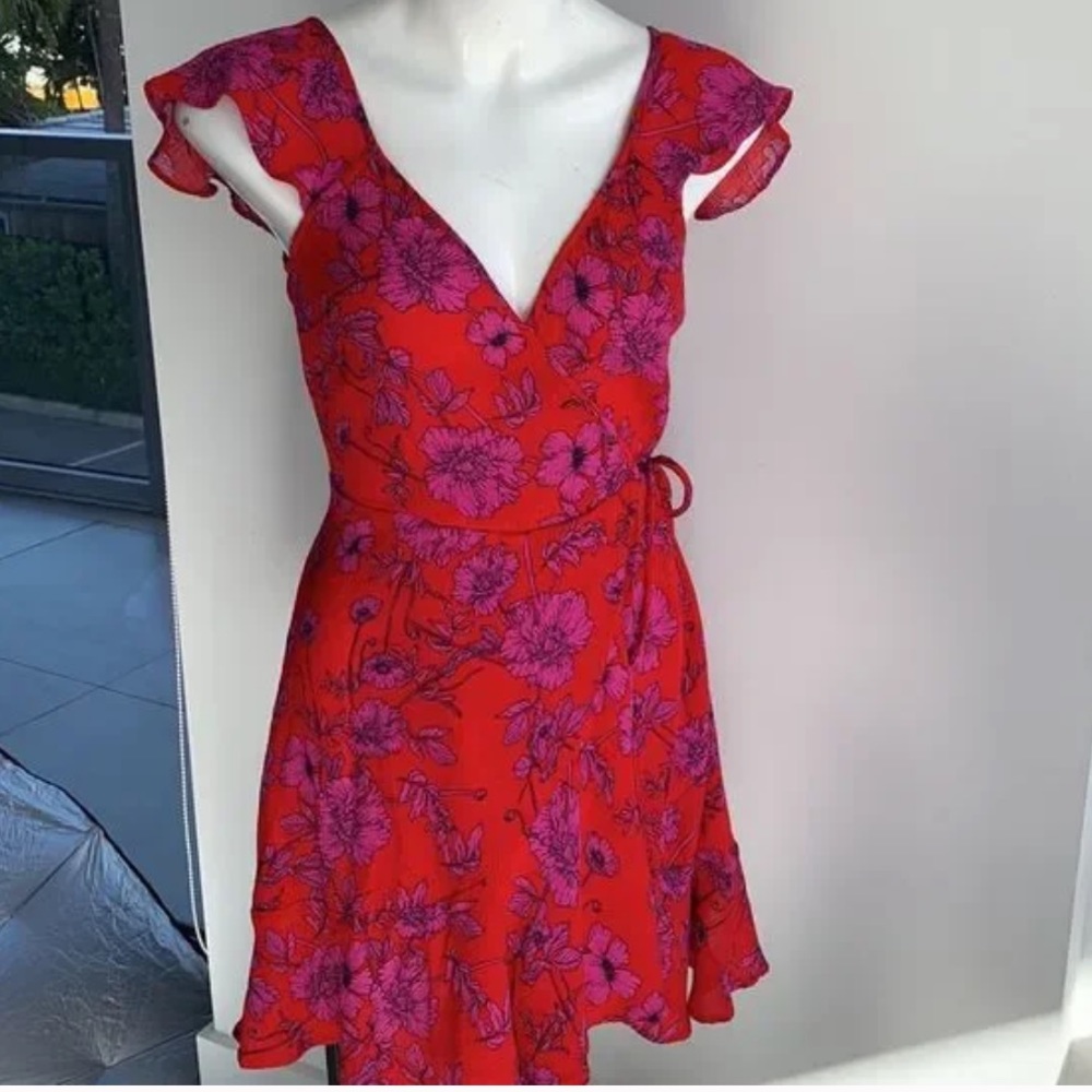 Never worn Band of gypsies floral ruffle dress size M.  Beautiful color!